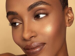 photo of beautiful dark skin woman with glowing skin