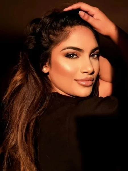 photo of women with bronze eye makeup and highlighted cheek bones