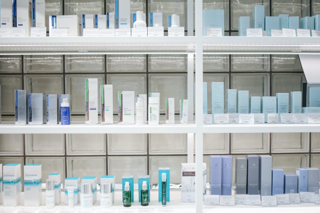 Lots of different skincare products on shelves. 