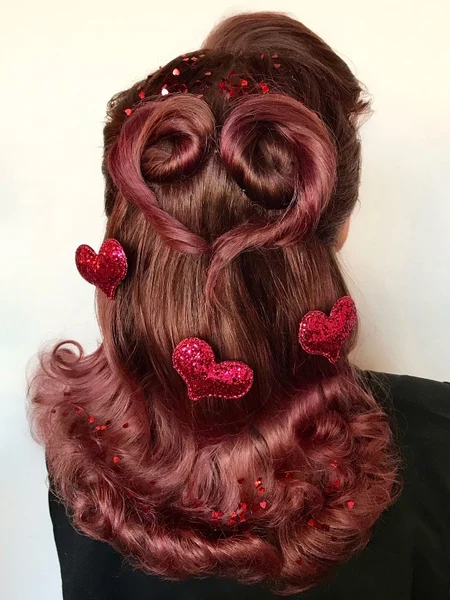 Red hair with rhinestones and heart decals.