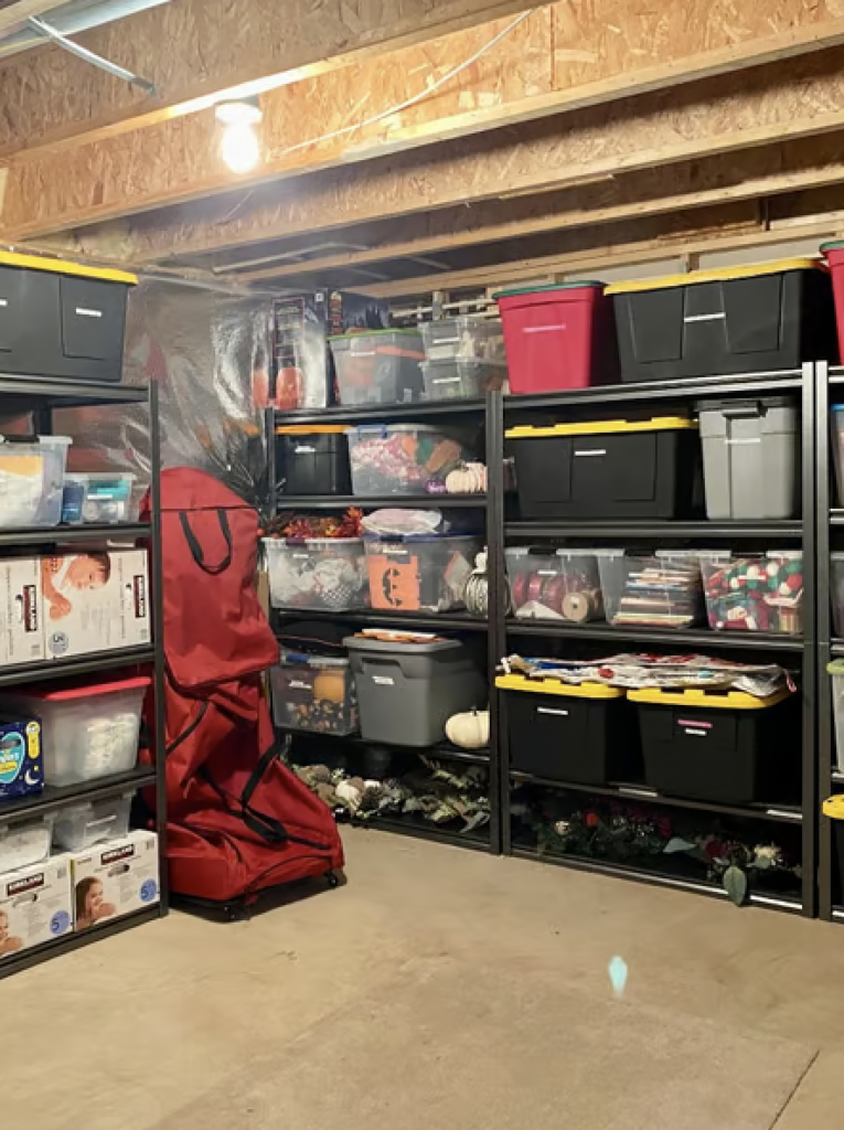 A garage with lots of storage bins. 