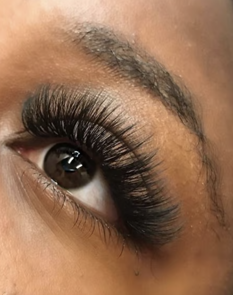 Close up image of an eye with mega volume lash extensions.