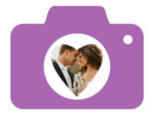 Image of a camera with a heart shaped lens with a wedding photo.