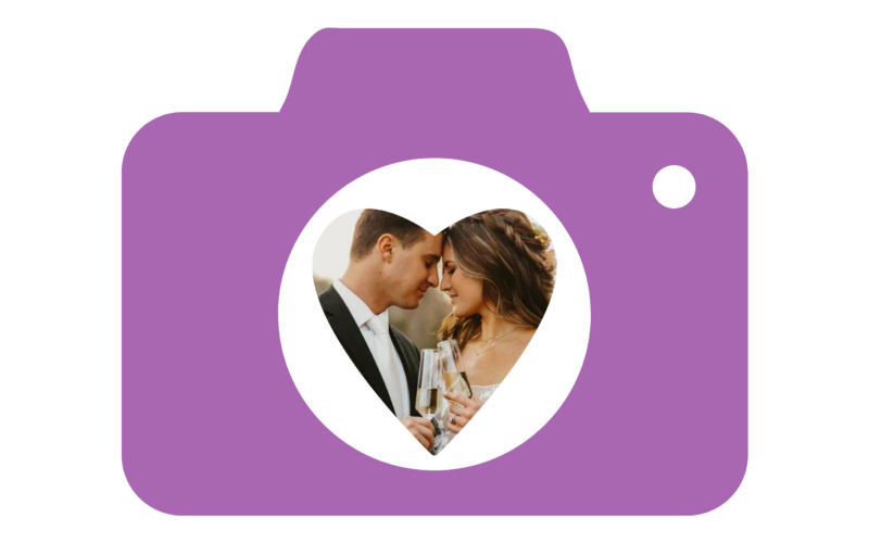 Image of a camera with a heart shaped lens with a wedding photo.