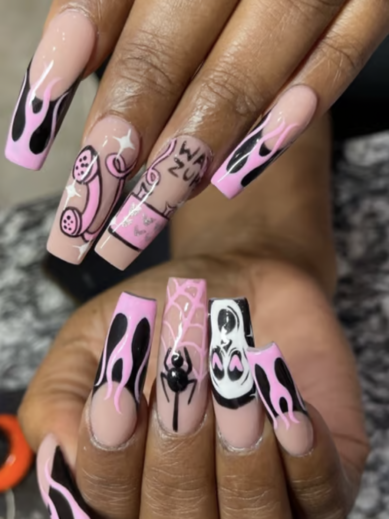 Pink and black "Scream" inspired manicure with flames, telephone, and spider decals. 