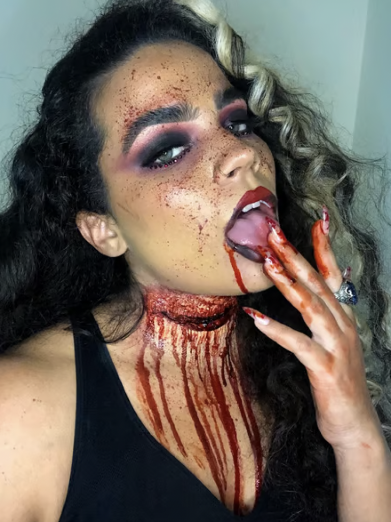 SFX Makeup with a slit neck and blood splatters